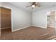 Bedroom with neutral carpeting, closet, and access to other areas at 10993 Ladyburn Ct, Las Vegas, NV 89141