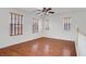 Bright bonus room with ceiling fan, wood floors and plenty of natural light at 11247 Villa Trentino Ct, Las Vegas, NV 89141