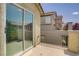 Balcony with concrete floors and wrought iron railings offers a relaxing outdoor space at 11247 Villa Trentino Ct, Las Vegas, NV 89141