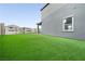 A view of backyard with artificial grass at 11800 Black Canary Ave, Las Vegas, NV 89138
