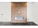 Modern fireplace with contemporary tile surround in open living area at 11800 Black Canary Ave, Las Vegas, NV 89138