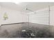 Clean garage featuring epoxy floor at 11800 Black Canary Ave, Las Vegas, NV 89138