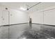 Garage featuring epoxy floor at 11800 Black Canary Ave, Las Vegas, NV 89138