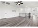 The open loft boasts wood-look floors and lots of natural light at 11800 Black Canary Ave, Las Vegas, NV 89138