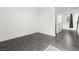 Neutral room featuring gray tile flooring with trim and doorframe at 11800 Black Canary Ave, Las Vegas, NV 89138