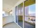 A spacious balcony with sliding glass doors offers stunning city views and outdoor living space at 125 E Harmon Ave # 2814/2816, Las Vegas, NV 89109