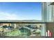 Breathtaking balcony view overlooking the city, golf course, and surrounding mountains on a clear, sunny day at 125 E Harmon Ave # 2814/2816, Las Vegas, NV 89109