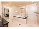 Spacious bathroom featuring a walk-in shower, soaking tub, and granite countertop on the double sink vanity at 125 E Harmon Ave # 2814/2816, Las Vegas, NV 89109