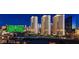Beautiful nighttime view of a vibrant city skyline featuring the MGM Grand and several high-rise buildings at 125 E Harmon Ave # 2814/2816, Las Vegas, NV 89109