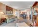 Comfortable living area with a sofa, modern decor and views to the kitchen at 125 E Harmon Ave # 2814/2816, Las Vegas, NV 89109