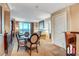 Stylish living area featuring a round glass dining table, city views, and comfortable seating at 125 E Harmon Ave # 2814/2816, Las Vegas, NV 89109