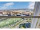 Balcony view highlighting the city skyline, mountains, and the entertainment complex below at 125 E Harmon Ave # 2814/2816, Las Vegas, NV 89109