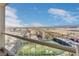 Balcony view showcasing the city skyline and golf entertainment complex below at 125 E Harmon Ave # 2814/2816, Las Vegas, NV 89109