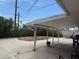 Spacious covered patio, perfect for outdoor entertaining, with a large yard at 1331 Smoke Tree Ave, Las Vegas, NV 89108
