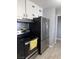 Functional kitchen with stainless steel refrigerator at 1331 Smoke Tree Ave, Las Vegas, NV 89108