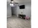 Open living area featuring modern wood-look tile at 1331 Smoke Tree Ave, Las Vegas, NV 89108