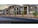 Newer model townhome exterior featuring neutral colors, balconies, and landscaping at 147 Harmonica Ave # Lot 24, Henderson, NV 89015