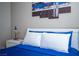Bright bedroom featuring a comfortable bed and bedside table at 1511 Living Desert Dr # C, Las Vegas, NV 89119