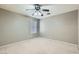 Well-lit bedroom with neutral walls, plush carpet, and a window for natural light at 1733 Gentle Brook St, North Las Vegas, NV 89084