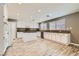 Bright kitchen with white cabinets, wood countertops, stainless appliances, and wood floors at 1733 Gentle Brook St, North Las Vegas, NV 89084