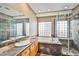 Bathroom features a tub, glass shower, and sink with granite countertops at 1742 Sand Storm Dr, Henderson, NV 89074