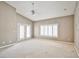 Large carpeted main bedroom features double doors and shutters on the windows at 1742 Sand Storm Dr, Henderson, NV 89074