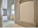 Hallway and nook with architectural features provides pathway to a bathroom at 1742 Sand Storm Dr, Henderson, NV 89074