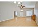 Bright and airy living room showcasing beautiful hardwood floors and neutral paint at 1742 Sand Storm Dr, Henderson, NV 89074