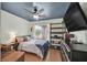 Bedroom featuring dark blue accents and a window, and plenty of storage at 2011 Mountain Sunset Ave, North Las Vegas, NV 89031