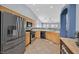Modern kitchen with stainless steel appliances, granite countertops, and ample cabinet space at 2011 Mountain Sunset Ave, North Las Vegas, NV 89031
