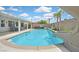 Backyard oasis featuring a sparkling pool with slide and seating area perfect for entertaining at 2011 Mountain Sunset Ave, North Las Vegas, NV 89031