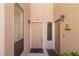Building entrance featuring dual entry doors with decorative accents and address numbers at 2050 W Warm Springs Rd # 2822, Henderson, NV 89014