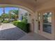 Exterior view of fitness center entrance with manicured landscaping and paved walkway at 2050 W Warm Springs Rd # 2822, Henderson, NV 89014