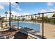 Tennis court with a black fence and clear blue skies with scattered clouds above at 2050 W Warm Springs Rd # 2822, Henderson, NV 89014