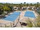 Overhead view of tennis courts and palm trees within the residential community at 2050 W Warm Springs Rd # 2822, Henderson, NV 89014