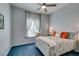 Bedroom with a ceiling fan, bed with pillows, and window with natural light at 2305 W Horizon Ridge Pkwy # 3713, Henderson, NV 89052