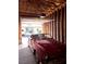 Spacious garage interior with vintage sports car inside at 2305 W Horizon Ridge Pkwy # 3713, Henderson, NV 89052
