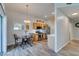Eat-in kitchen area with stainless appliances, wood cabinets, and a chandelier at 2305 W Horizon Ridge Pkwy # 3713, Henderson, NV 89052