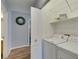 Laundry room with a washer, dryer, and shelving at 2305 W Horizon Ridge Pkwy # 3713, Henderson, NV 89052