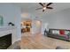 Open-concept living room leading to the dining area and kitchen with wood-look flooring at 2305 W Horizon Ridge Pkwy # 3713, Henderson, NV 89052