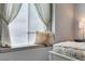 Bedroom with a large window seat, and curtains to create a cozy space at 2305 W Horizon Ridge Pkwy # 3713, Henderson, NV 89052