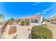 Backyard featuring desert landscaping, covered patio, and well-maintained exterior at 2377 Baldwinville Ct, Henderson, NV 89044