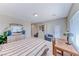 Bright bedroom features a large window, comfortable bed, and ample space at 2377 Baldwinville Ct, Henderson, NV 89044