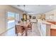 Eat-in kitchen area offering sliding glass doors leading to outdoor space and backyard views at 2377 Baldwinville Ct, Henderson, NV 89044