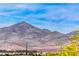 Panoramic view of desert landscape and mountain range, highlighting the natural beauty of the property's surroundings at 2377 Baldwinville Ct, Henderson, NV 89044