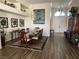 Formal dining room with elegant decor, wainscoting, and a large entryway at 2559 Purple Heather Pl, Henderson, NV 89052