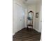 Entryway with decorative mirror, small table, and decorative vase at 2559 Purple Heather Pl, Henderson, NV 89052