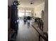Bright and spacious living area with hardwood floors and large windows, ideal for gatherings at 2559 Purple Heather Pl, Henderson, NV 89052