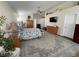 Spacious main bedroom with neutral tones, a ceiling fan, and ample closet space at 2559 Purple Heather Pl, Henderson, NV 89052