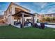 Backyard featuring a pool, outdoor seating and BBQ area for enjoying outdoor living and dining at 26 Olympia Outlook Dr, Las Vegas, NV 89141